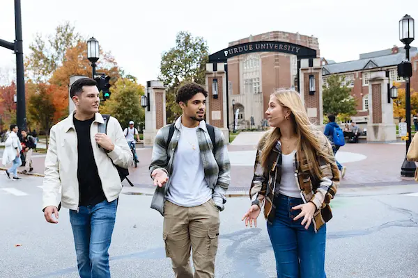 Three students walking
